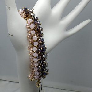 Ali Khan beaded bracelet with gold links. color amethyst-lilac-hematite beads